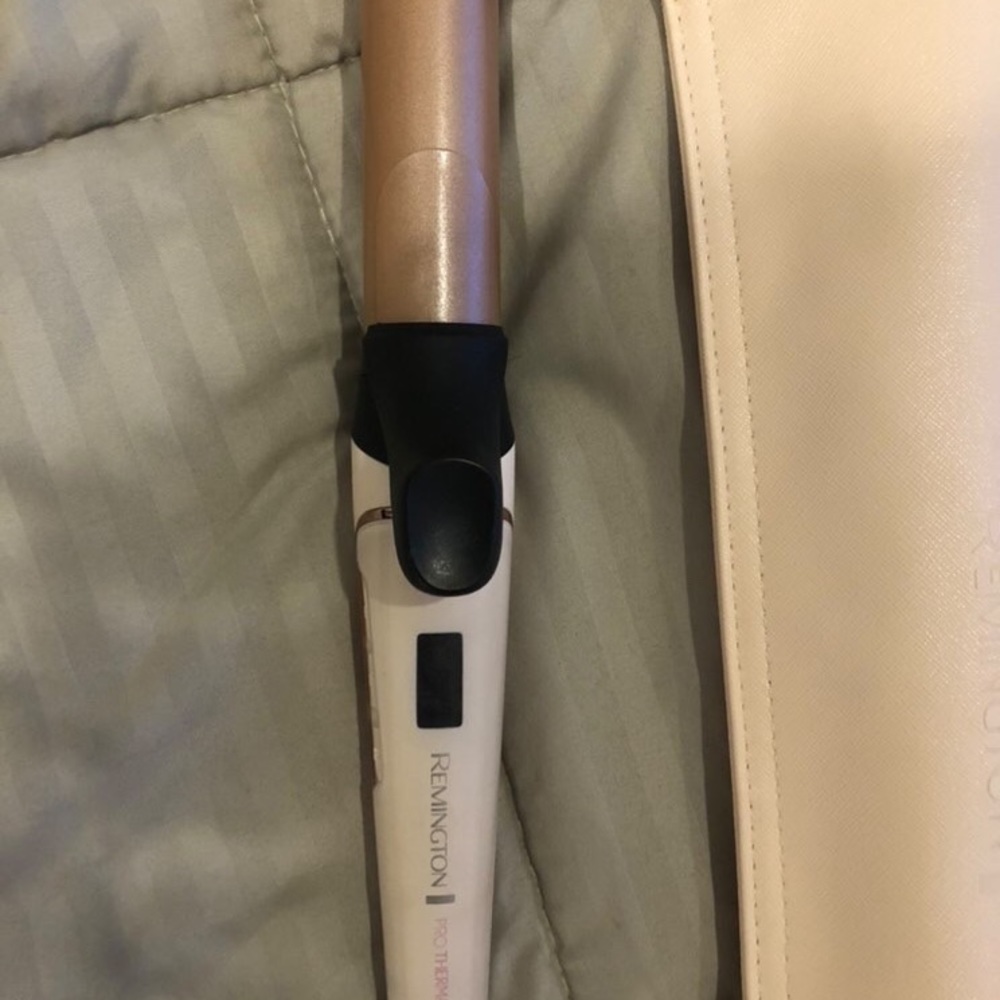 Remington curler , with bag